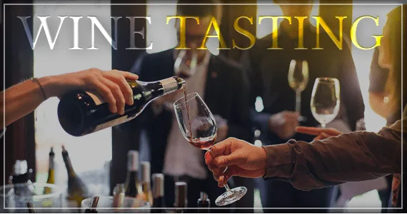 Persona sirviendo vino tinto en una copa durante una cata de vinos, con varias botellas y asistentes al fondo en un ambiente elegante; en la parte superior aparece el texto “WINE TASTING”.